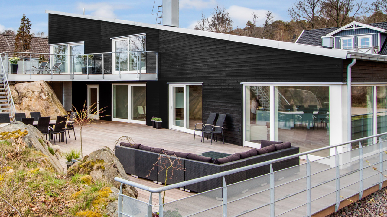 Svart fadadfärg Svarta hus